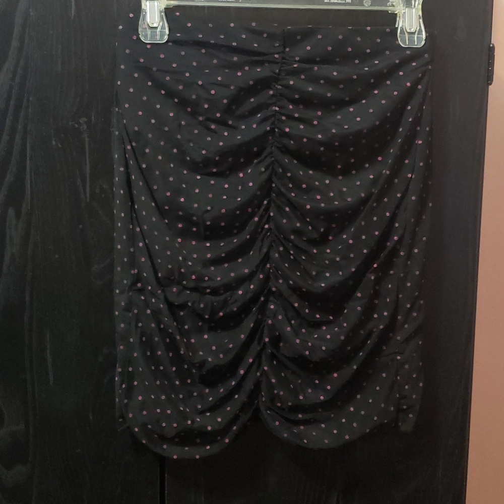 Black and pink polka-dot skirt